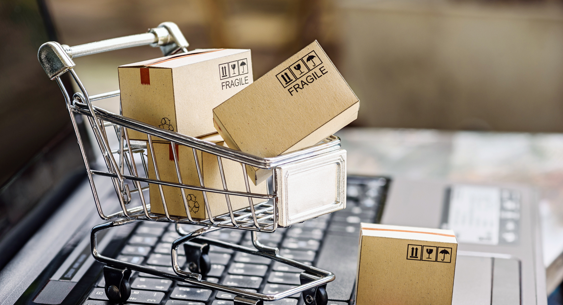 mini shopping cart on keyboard