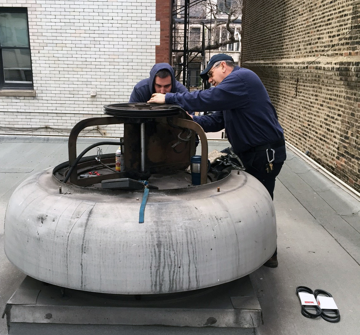 Edwards Engineering Techs on roof