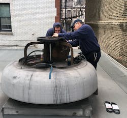 Edwards Engineering Techs on roof Edwards Engineering Techs on roof