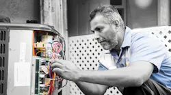 hvac technician servicing unit