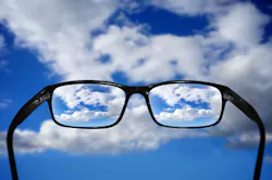 eyeglasses and cloudy sky