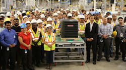 The manufacturing crew and CEO Takeshi Ebisu, with the first Goodman unit to come off the line at the new Daikin Texas Technology Park, in 2017.