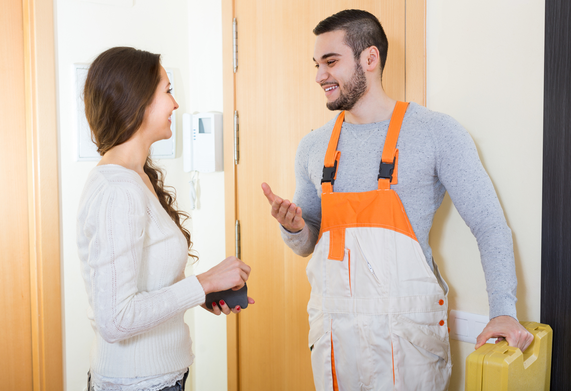 Repairman with customer