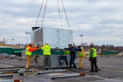 IFS crew lowers unit into place IFS crew lowers unit into place