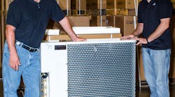 Good news: Steve Intagliata, left, and Bob Martin of Unico, Inc. were all smiles when a shipment of the new iSeries multi-split HVAC systems arrived at their facility in St. Louis.