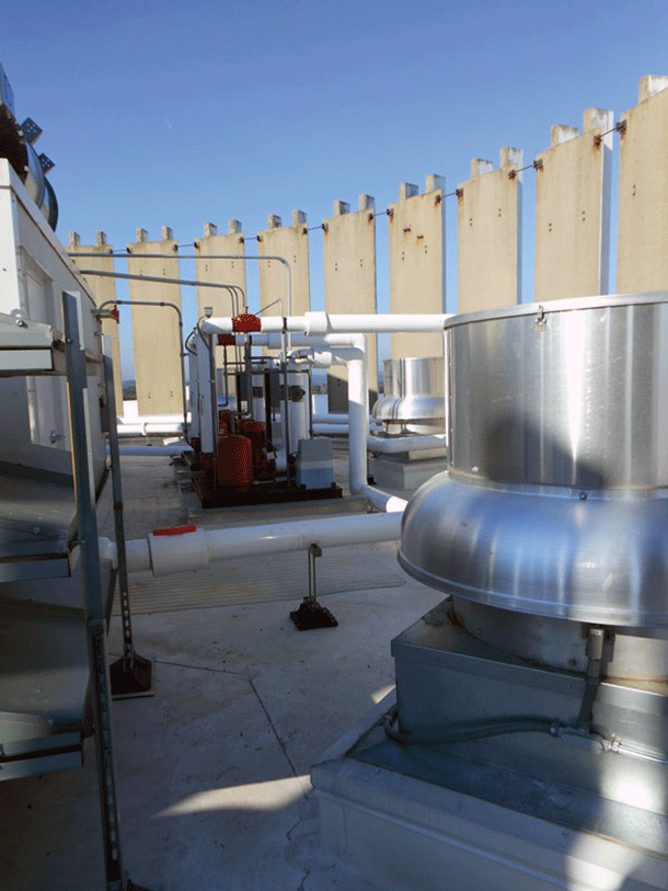 This view of the Portage Trail Village rootop shows two of the seven air handlers installed by Air Force One and the main pumping station Photos by Terry McIver