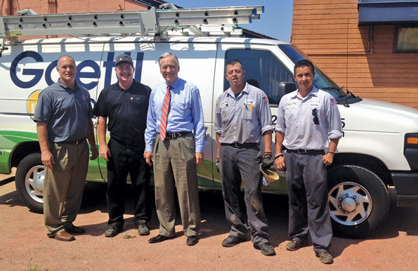Pictured at the St Catherine school replacement project are from right to left Norman Ballesteros installer for Goettl Fermin Nevarez installer for Goettl Randy Pullen member of the Goettl board of directors Greg Akers service manager Goettl and Rob Rogers principal of St Catherine of Siena