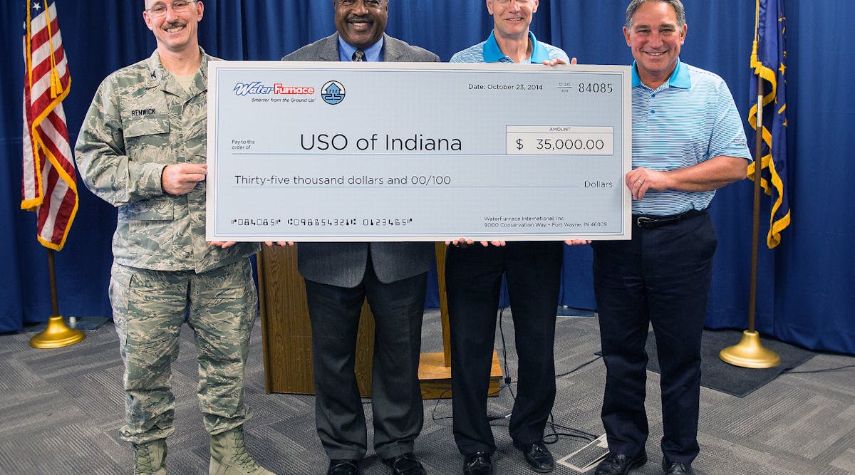 Tom Huntington, right, WaterFurnace president and CEO, presented a check to the USO of Indiana during an Oct. 23 news conference at the company&rsquo;s corporate headquarters in Fort Wayne, IN. With him, from left are, Col. Patrick Renwick, Wing Commander, 122nd ANG; James Pridgen, President &amp; CEO, USO of Indiana; Carl Huber, vice president, corporate quality, WaterFurnace International.