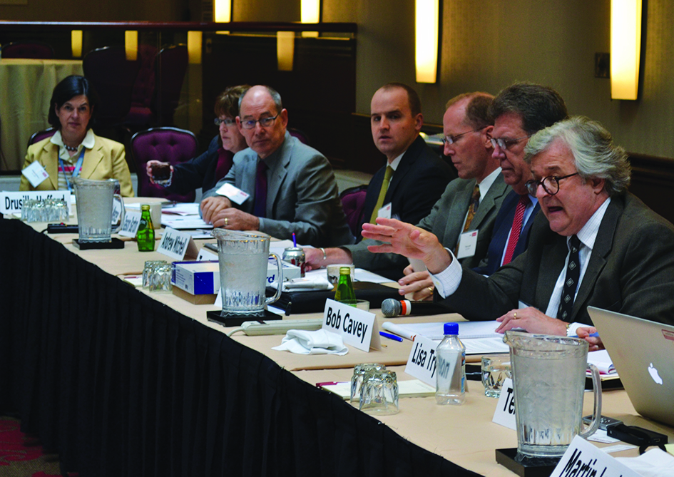 Danfoss Symposium moderator Robert Cavey right said the refrigeration industry is facing interesting challenges ldquoThe only way it will work is if the people in this industry all put their oars in the waterrdquo he said