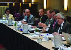 Danfoss Symposium moderator Robert Cavey right said the refrigeration industry is facing interesting challenges ldquoThe only way it will work is if the people in this industry all put their oars in the waterrdquo he said Danfoss Symposium moderator Robert Cavey right said the refrigeration industry is facing interesting challenges ldquoThe only way it will work is if the people in this industry all put their oars in the waterrdquo he said