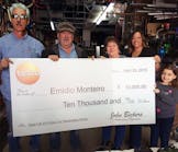 Emidio Monteiro, second from left, owner of Eurotech Climate Systems LLC, Pawtucket, RI, accepts the Testo Fall 2014 Race Car Trip Sweepstakes prize check with his family. Photo courtesy Testo.