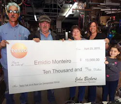 Emidio Monteiro second from left owner of Eurotech Climate Systems LLC Pawtucket RI accepts the Testo Fall 2014 Race Car Trip Sweepstakes prize check with his family Photo courtesy Testo