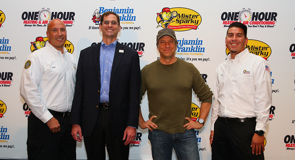 Pictured from left to right Scott Groskranz Mister Sparky electrician Mark Baker president of franchises for the three Direct Energy Services brands Mike Rowe and Pablo Becantur Mister Sparky electrician