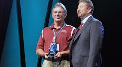Mike Feutz, left, received the MSCA D.S. O&apos;Brien Award of Excellence from Scott Berger, 2015 chairman of the MSCA Board of Managers. Photo by Terry McIver