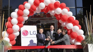 Serving as ribbon-cutters at the LG opening are, from left, Mr. William Cho, president, LG Electronics, USA; Kevin McNamara, senior vice president, LG Air Conditioning Systems; Mr. Hwan-Yong Nho, president/CEO, Air Conditioning &amp; Energy Solution Company; and Ellen Kim, senior vice president and AE leader for LG Electronics, USA. Photo: John Amis