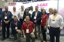 The A-Gas refrigerants team at the AHR Expo in Orlando. Back row, from left: David Griggs, Paul Voelker, Jeff Kernaghan, Kurt Dawson, Tim Amburgey and Allyson Paige. Middle: Sheila Hope, Ken Logan, Judy Manke and Jonathan Stack. Front: Robert Hennessy and Taylor Ferranti.