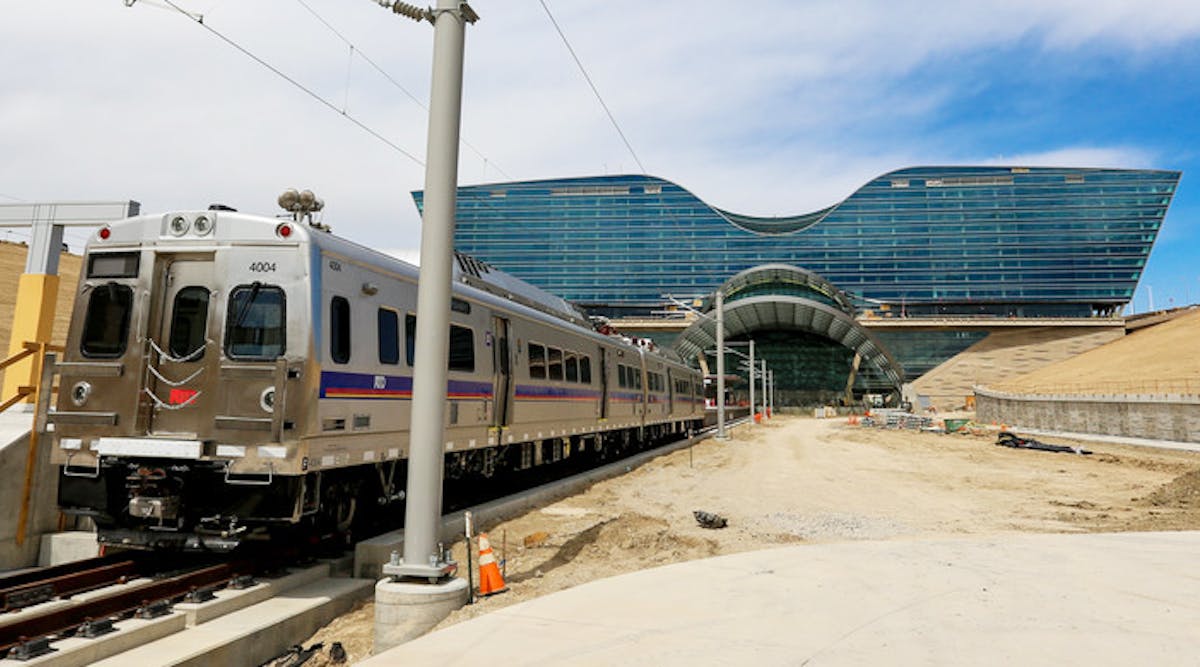 A train makes its way into the new Transit Center beneath the Westin Hotel. The hotel was designed this way because the airport needed at least 500 rooms for the hotel to be financially viable, but it can only be so high due to FAA limitations, and can only be so wide because there are roads on both sides. A plan was devised to build a hotel that might have an odd shape, but had enough space for what turned out to be 519 guest rooms, plus a convention center, transit center and plaza. Photos courtesy Burgess Services