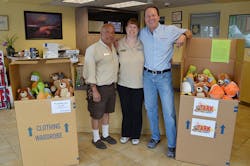 George and Susan Perez managers at Storage West on Ann Road stand with Scott Meier coowner of Right Now Air and two boxes of stuffed animals donated by Right Now Air to the Tark Toy Drive on Friday April 8 2016 George and Susan Perez managers at Storage West on Ann Road stand with Scott Meier coowner of Right Now Air and two boxes of stuffed animals donated by Right Now Air to the Tark Toy Drive on Friday April 8 2016