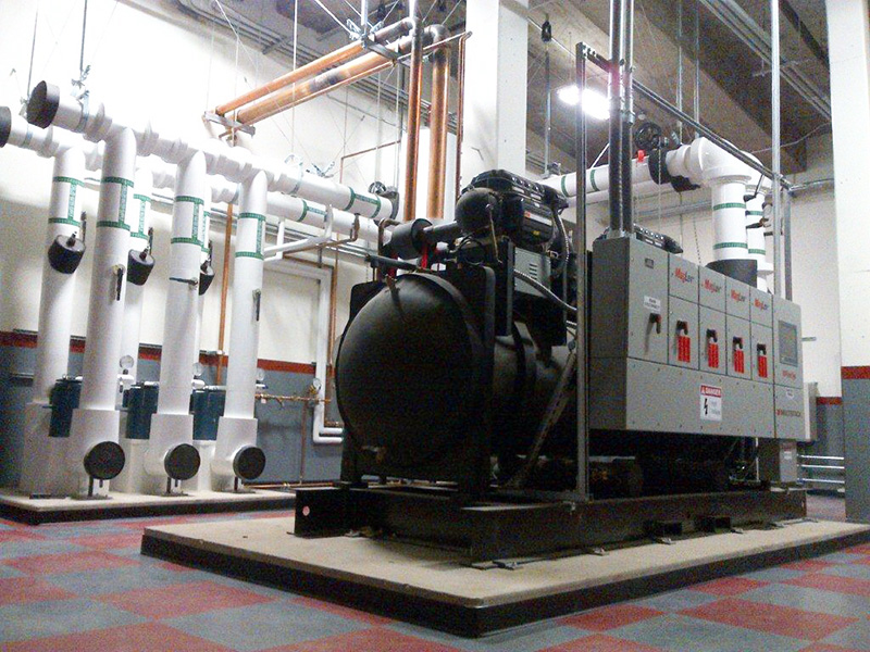 The engineer suggested replacing the screw chillers with a standard watercooled centrifugal chiller and replacing the evaporative condensers with cooling towers Ten or 12in diameter piping and pumps would circulate condenser water from the basement to the rooftop