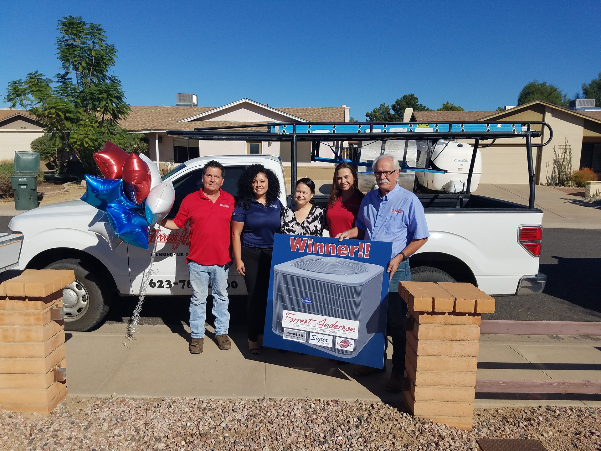 Left to right Mark Stevens of FA Lita Aguirre of Sigler winners wife Christine Harms FA President Audrey Monell Terry Church of FA