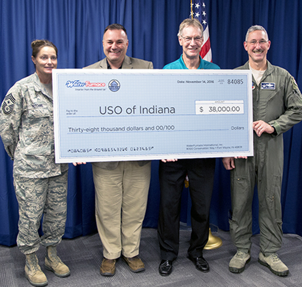 Carl Huber WaterFurnace vice president of corporate quality presented the check during an Nov 14 news conference at the companyrsquos corporate headquarters in Fort Wayne Ind Pictured left to right Chief Master Sergeant Christine Hutchins 122nd ANG Charles Ridings Executive Director USO of Indiana Carl Huber WaterFurnace Colonel Patrick Renwick Wing Commander 122nd ANG