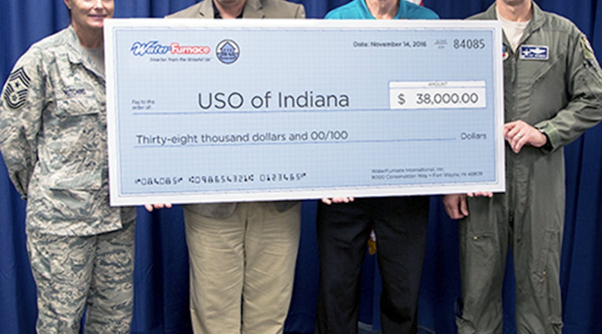 Carl Huber, WaterFurnace vice president of corporate quality, presented the check during an Nov. 14 news conference at the company&rsquo;s corporate headquarters in Fort Wayne, Ind. Pictured (left to right) - Chief Master Sergeant Christine Hutchins, 122nd ANG; Charles Ridings, Executive Director USO of Indiana; Carl Huber, WaterFurnace; Colonel Patrick Renwick, Wing Commander 122nd ANG.