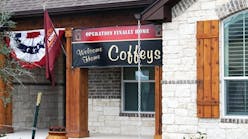 An OFH banner hangs above the entrance to the Coffeys new home.