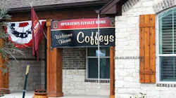 An OFH banner hangs above the entrance to the Coffeys new home