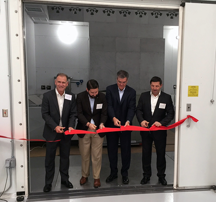 From left John Galyen president Danfoss North America Dustin Daniels chief of staff Office of the Mayor Tallahassee Ricardo Schneider president Danfoss Turbocor Compressors and Jurgen Fischer president Danfoss Cooling Solutions mdash as they cut the ribbon to officially open the first testing chamber