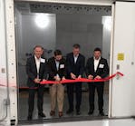 From left: John Galyen, president, Danfoss North America; Dustin Daniels, chief of staff, Office of the Mayor, Tallahassee; Ricardo Schneider, president, Danfoss Turbocor Compressors; and Jurgen Fischer, president, Danfoss Cooling Solutions &mdash; as they cut the ribbon to officially open the first testing chamber.