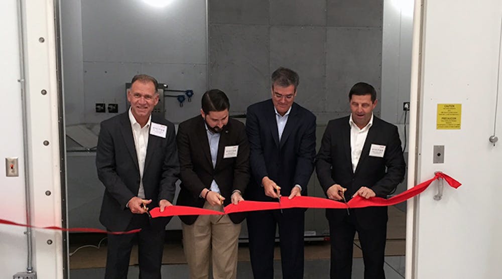 From left: John Galyen, president, Danfoss North America; Dustin Daniels, chief of staff, Office of the Mayor, Tallahassee; Ricardo Schneider, president, Danfoss Turbocor Compressors; and Jurgen Fischer, president, Danfoss Cooling Solutions &mdash; as they cut the ribbon to officially open the first testing chamber.