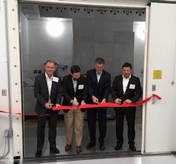 From left John Galyen president Danfoss North America Dustin Daniels chief of staff Office of the Mayor Tallahassee Ricardo Schneider president Danfoss Turbocor Compressors and Jurgen Fischer president Danfoss Cooling Solutions mdash as they cut the ribbon to officially open the first testing chamber From left John Galyen president Danfoss North America Dustin Daniels chief of staff Office of the Mayor Tallahassee Ricardo Schneider president Danfoss Turbocor Compressors and Jurgen Fischer president Danfoss Cooling Solutions mdash as they cut the ribbon to officially open the first testing chamber