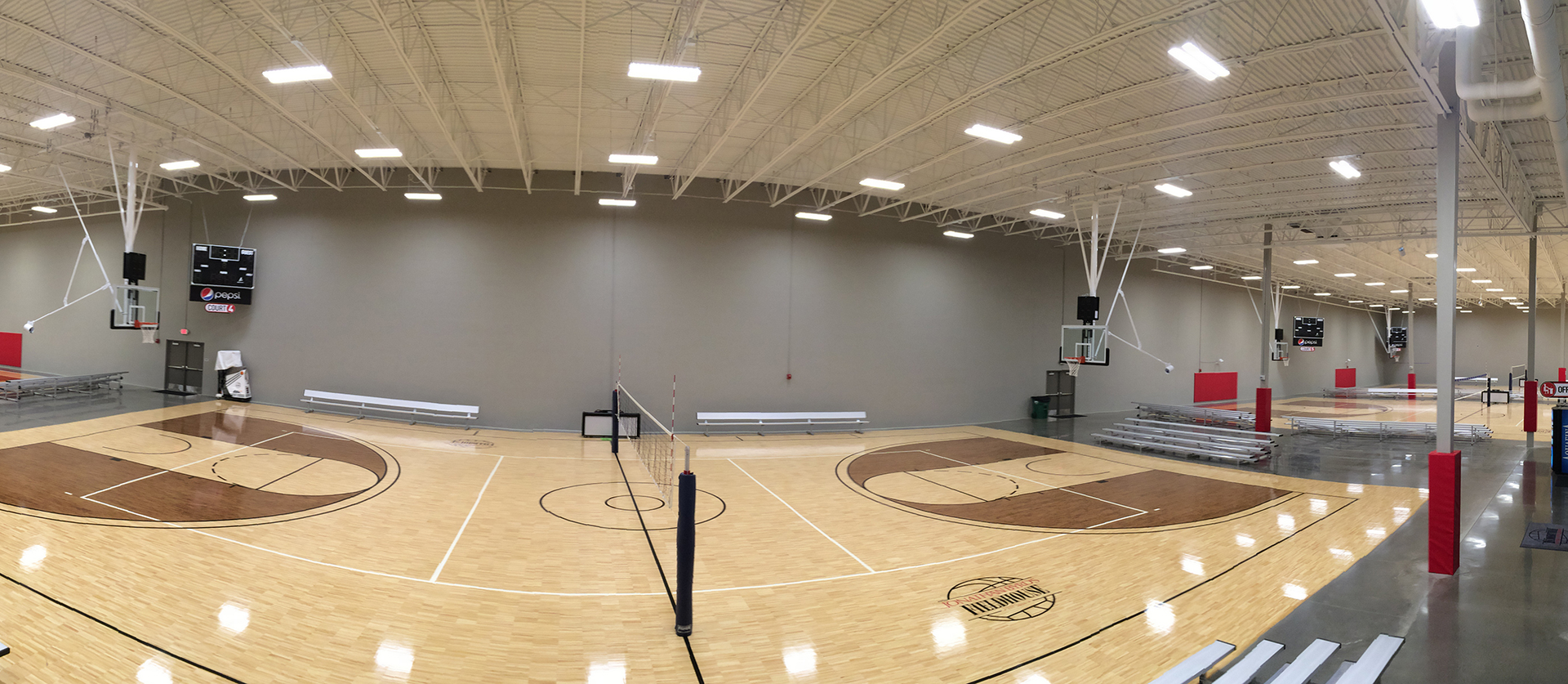 EFS designed and installed rooftop heating and cooling units to serve eight basketball and volleyball courts a mezzanine viewing area a restaurant with a full kitchen administrative offices and a concession area