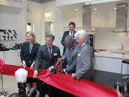 U.S. Congressman David Scott (D-GA), cuts the ribbonmarking the offical opening of the Bosch Experience Center at Serenbe.