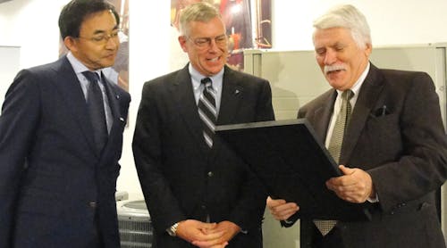 After the Daikin-Goodman team made a major announcement on new Daikin products that will be produced in the U.S., Andy Icken, chief economic development officer for the city of Houston (right) presents Takeshi Ebisu (left) and David Swift (middle) with a proclamation thanking the company for creating 250 new jobs and declaring November 7th as Daiken North America LLC Day in Houston.