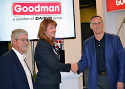 Brandy Powell vice president and general manager residential air conditioning for Emerson39s Commercial and Residential Solutions platform and Larry Blackburn executive vice president and president Goodman Business Unit shake hands during the announcement that Goodman and Emerson will combine technologies for a new 1618 SEER comfort system Karl Zellmer vice president air conditioning sales for Emerson is at left Brandy Powell vice president and general manager residential air conditioning for Emerson39s Commercial and Residential Solutions platform and Larry Blackburn executive vice president and president Goodman Business Unit shake hands during the announcement that Goodman and Emerson will combine technologies for a new 1618 SEER comfort system Karl Zellmer vice president air conditioning sales for Emerson is at left
