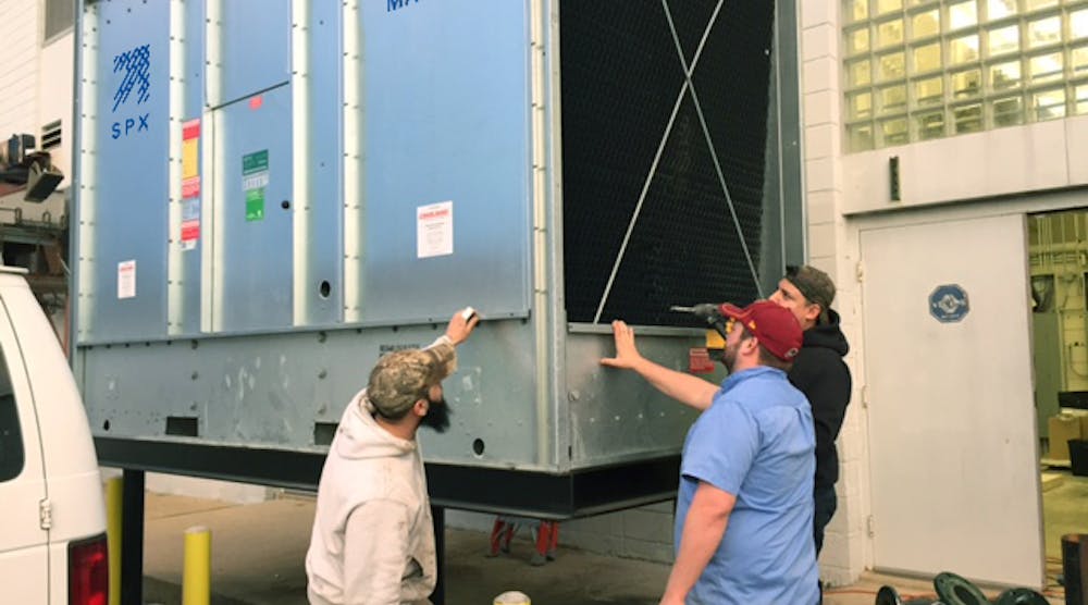 Students and instructors at the Steamfitters UA Local No. 602 Mechanical Trades School install a Marley NC cooling tower from SPX Cooling Technologies that serves as the centerpiece for learning the start-up, maintenance and troubleshooting of HVAC equipment.