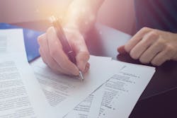 Signing contract.jpg Signing contract.jpg