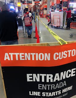 Shoppers wait their turn to checkout at a Home Depot, Cleveland, Oh. HD stores are limiting shoppers to 100 at any time. Shoppers wait their turn to checkout at a Home Depot, Cleveland, Oh. HD stores are limiting shoppers to 100 at any time.