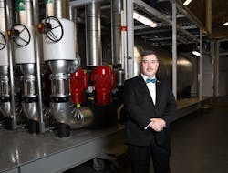 Charles Gulledge III delivered his ASHRAE Presidential Address against the background of a facility mechanical room, a critical part of the mechanical built environment.