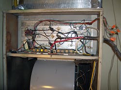 Electric furnace with questionable wiring. Electric furnace with questionable wiring.