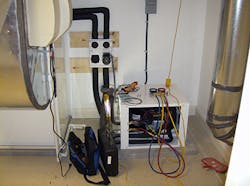 Technicians should know the basics when servicing a typical heat pump like the one in this photo.