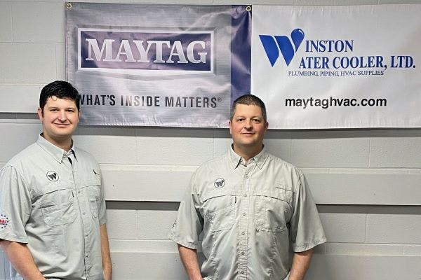 Kirk Craddick and Keith Craddick, co-partners at the new Winston Water Cooler, Lubbock, Texas, now distribute Maytag equipment.