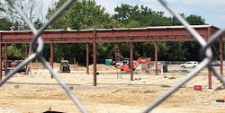 Jobsite Through Fence2 60ba795735484 Jobsite Through Fence2 60ba795735484