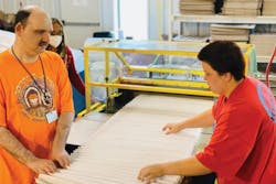Matt and Traci work the pleating machine at the Filters for Life plant. Matt and Traci work the pleating machine at the Filters for Life plant.