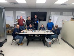 Nortek Air Solutions trainers are shown with the CFL adults. Nortek Air Solutions trainers are shown with the CFL adults.