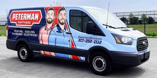 The Peterman Brothers new truck wrap was designed by KickCharge Creative.