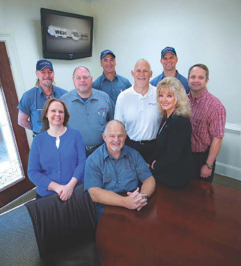 Steve Wright, Sr., seated front, with wife Beverly at right, and others from the Wright Brothers 2013 management team.