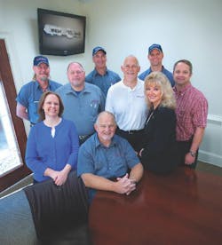 Steve Wright, Sr., seated front, with wife Beverly at right, and others from the Wright Brothers 2013 management team. Steve Wright, Sr., seated front, with wife Beverly at right, and others from the Wright Brothers 2013 management team.