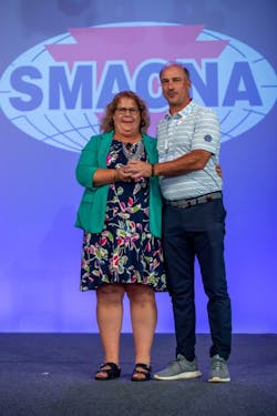 Tom Martin, president of T.H. Martin, Inc., Cleveland, Oh., was elected by the Board of Directors to serve as SMACA vice president. He is shown here with SMACNA President Angie Simon. Tom Martin, president of T.H. Martin, Inc., Cleveland, Oh., was elected by the Board of Directors to serve as SMACA vice president. He is shown here with SMACNA President Angie Simon.